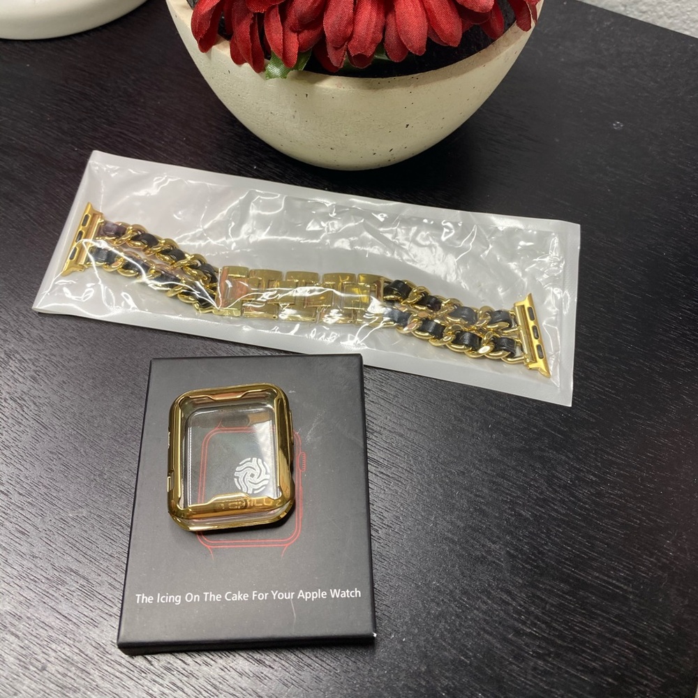 Apple Watch strap with screen protector in gold.